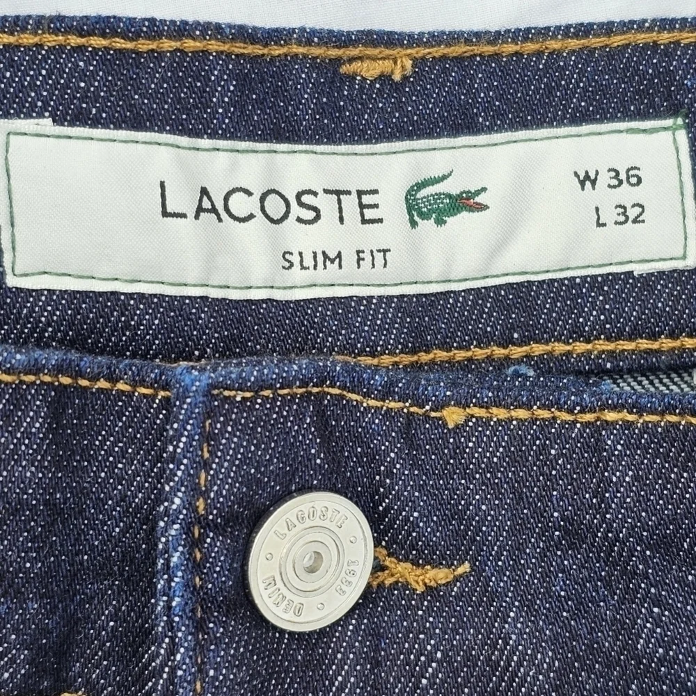 LACOSTEMen's Slim-Fit Stretch Solid Jeans dark wash color ML4 size W36×32L